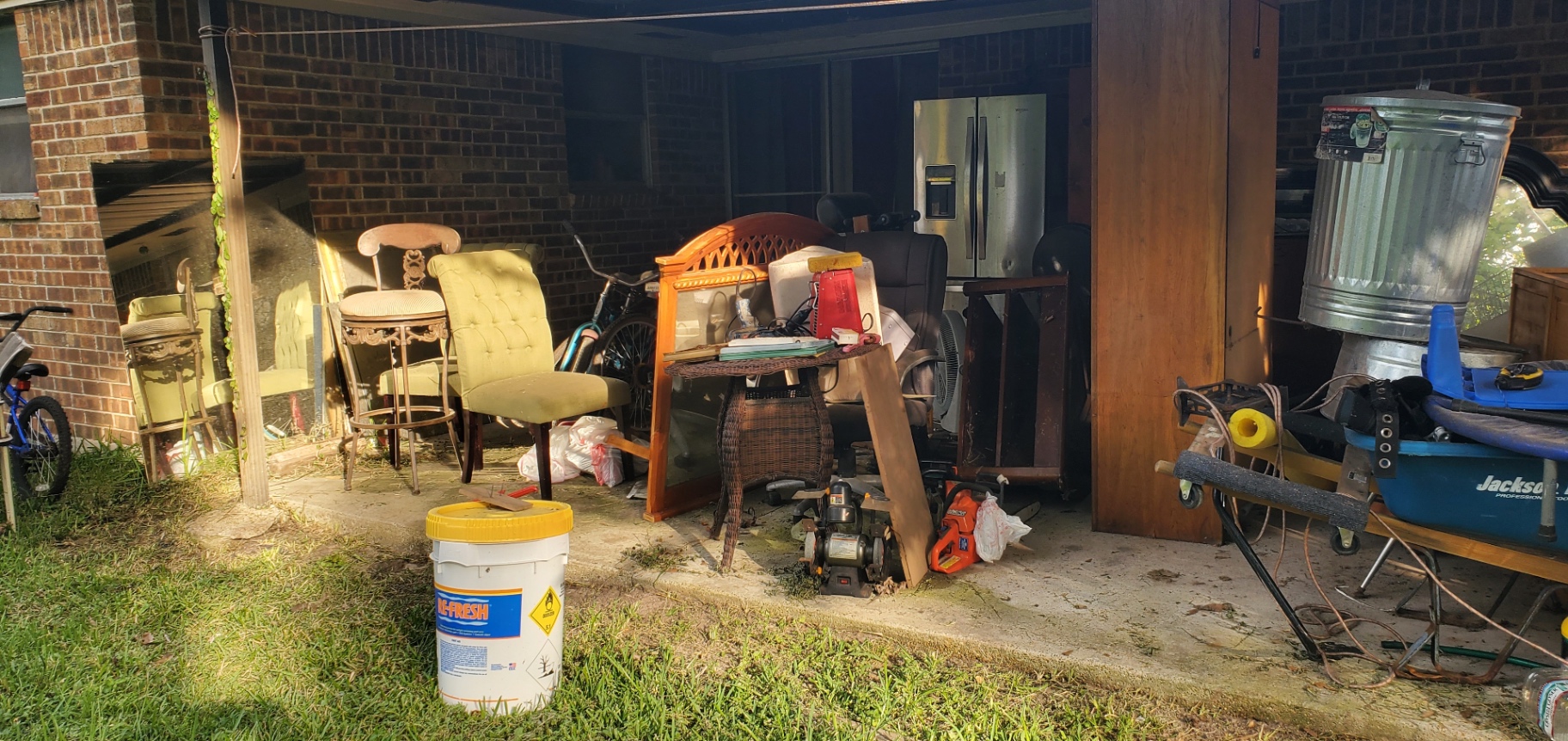 Houston carport and patio cleanout by Holman Hauling — before