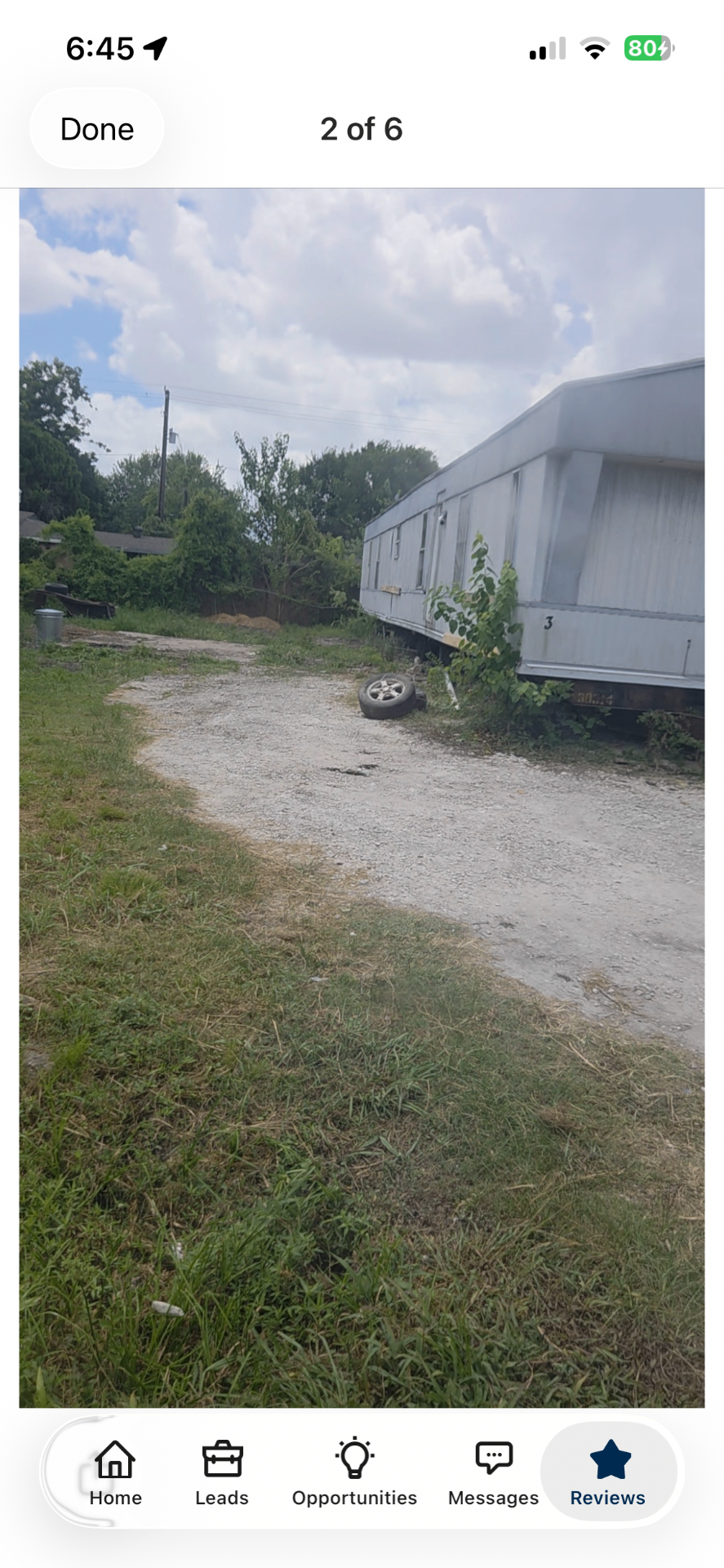 Houston backyard and side-lot cleanup by Holman Hauling — after