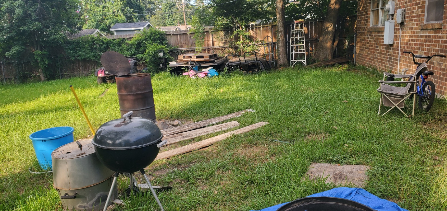 Houston backyard cleanup by Holman Hauling — before